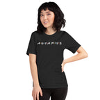 Person wearing Aquarius zodiac 90s nostalgia graphic t-shirt in black, unisex astrology apparel