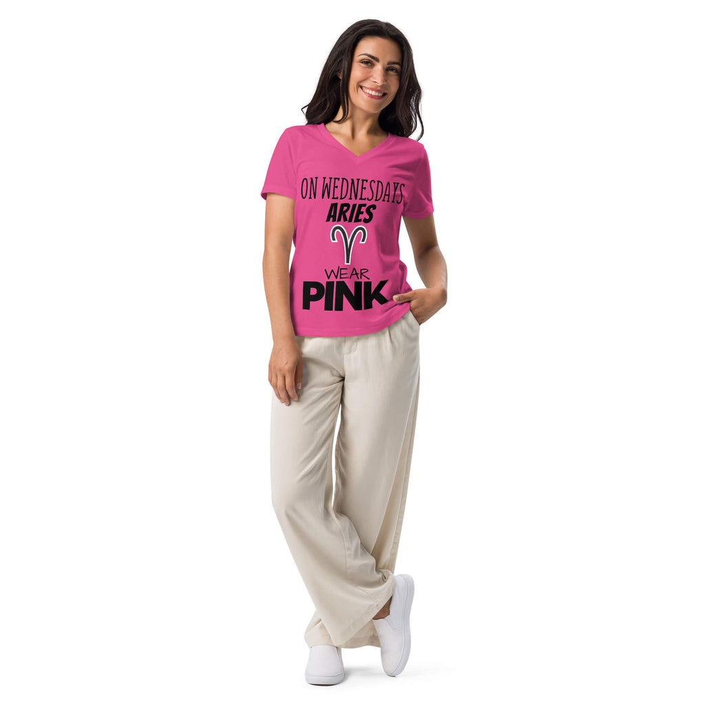 Woman wearing Aries zodiac "Wears Pink" graphic v-neck t-shirt in pink, women's astrology apparel