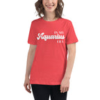 Woman wearing "In My Aquarius Era" Aquarius zodiac graphic t-shirt in coral red, women's astrology apparel