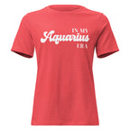 "In My Aquarius Era" zodiac graphic t-shirt, coral red, women's fitted astrology apparel, front flat lay