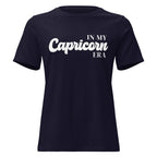 "In My Capricorn Era" zodiac graphic t-shirt, navy blue, women's fitted astrology apparel, front flat lay