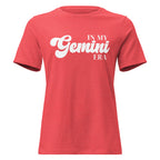 "In My Gemini Era" zodiac graphic t-shirt, coral red, women's fitted astrology apparel, front flat lay