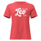 Woman wearing "In My Leo Era" Leo zodiac graphic t-shirt in coral red, women's astrology apparel