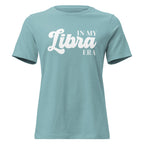 "In My Libra Era" zodiac graphic t-shirt, lagoon blue, women's fitted astrology apparel, front flat lay