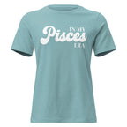 "In My Pisces Era" zodiac graphic t-shirt, lagoon blue, women's fitted astrology apparel, front flat lay