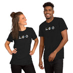 Two people wearing Leo zodiac 90s nostalgia graphic t-shirts in black, lifestyle photo