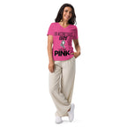 Woman wearing Leo zodiac "Wears Pink" graphic v-neck t-shirt in pink, women's astrology apparel