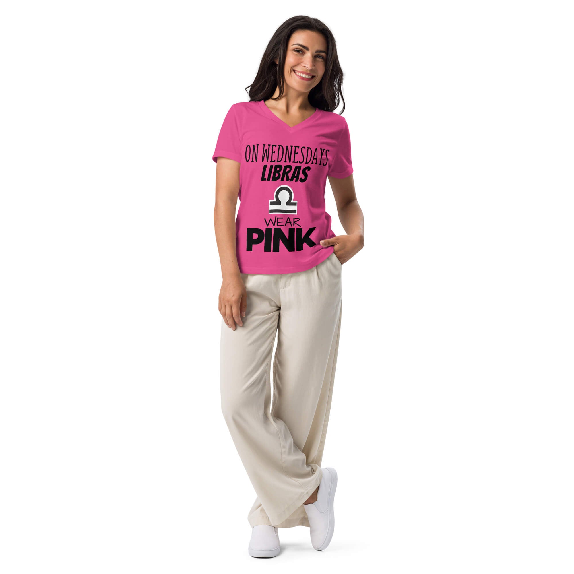 Woman wearing Libra zodiac "Wears Pink" graphic v-neck t-shirt in pink, women's astrology apparel
