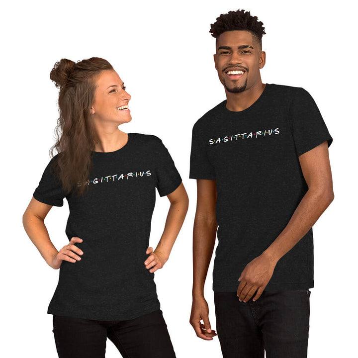 Two people wearing Sagittarius zodiac 90s nostalgia graphic t-shirts in black, lifestyle photo