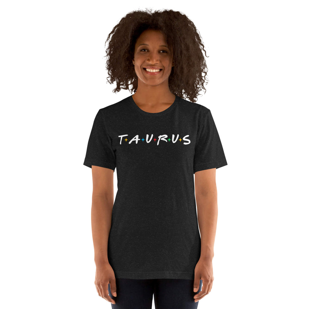 Woman wearing Taurus zodiac 90s nostalgia graphic t-shirt in black, retro astrology apparel