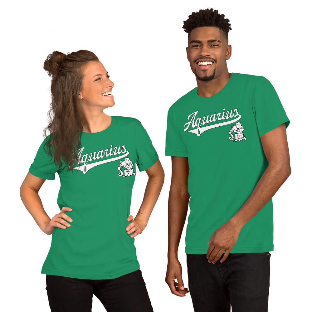 A man and a woman modeling matching green short-sleeve t-shirts with a white 'Aquarius' script and zodiac graphic on the chest, set against a plain white background.