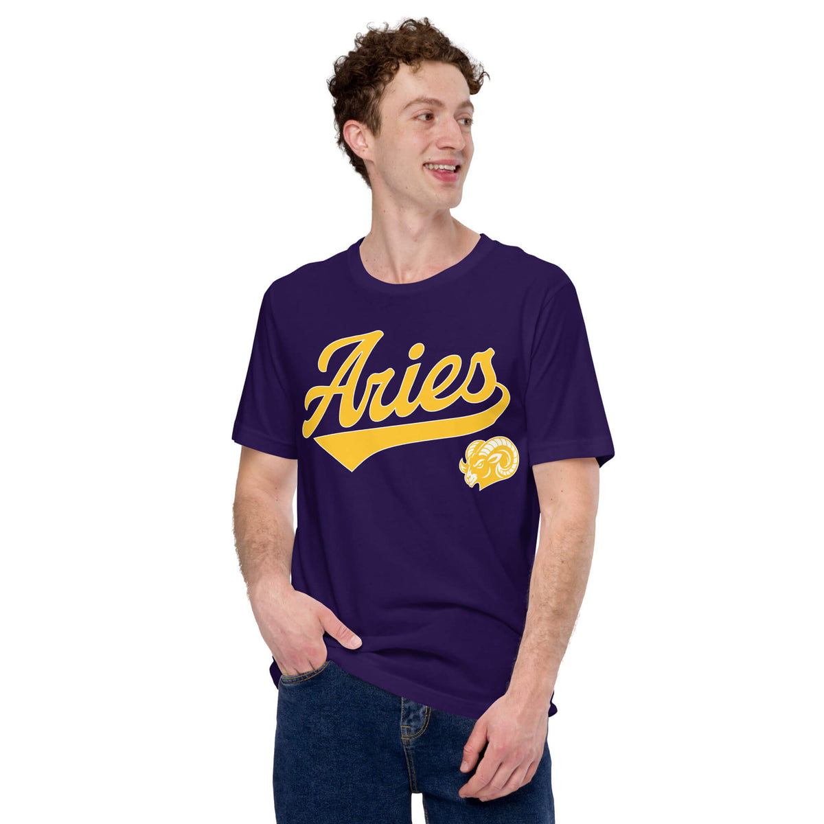 A man wearing a purple short-sleeve t-shirt with a gold 'Aries' graphic and ram logo on the front, paired with blue jeans, against a plain white background.