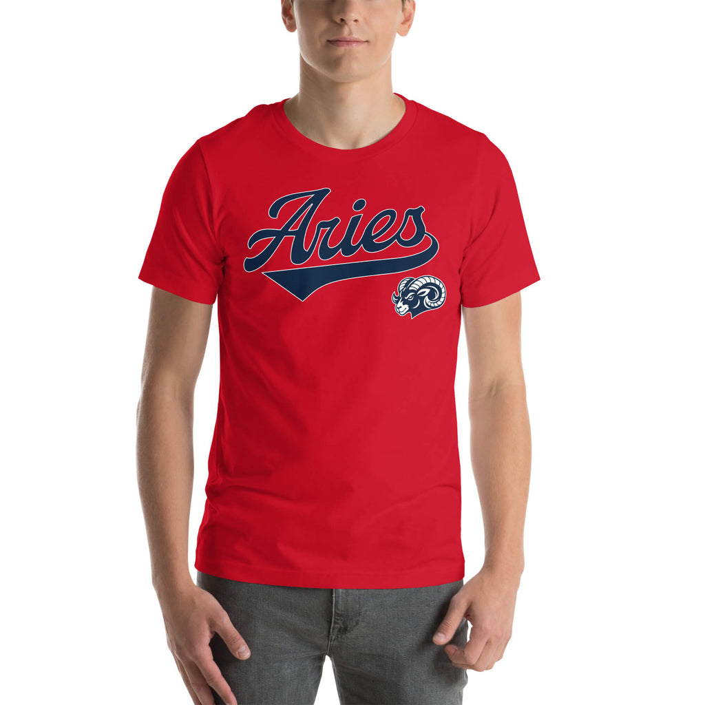 A man wearing a bright red short-sleeve t-shirt with 'Aries' in navy blue script across the chest, accompanied by a small ram mascot logo on the lower right chest, set against a plain white background.