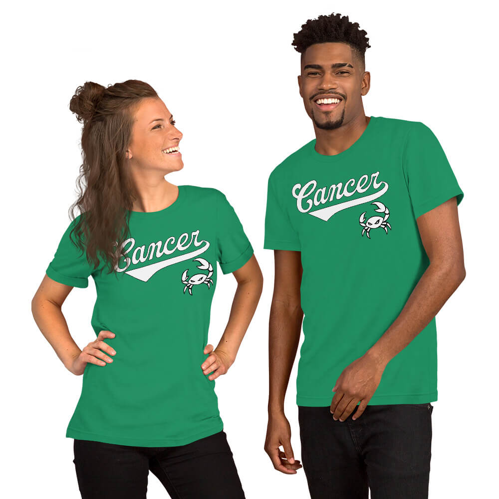 Two people wearing green t-shirts with 'Cancer' zodiac graphic on a white background