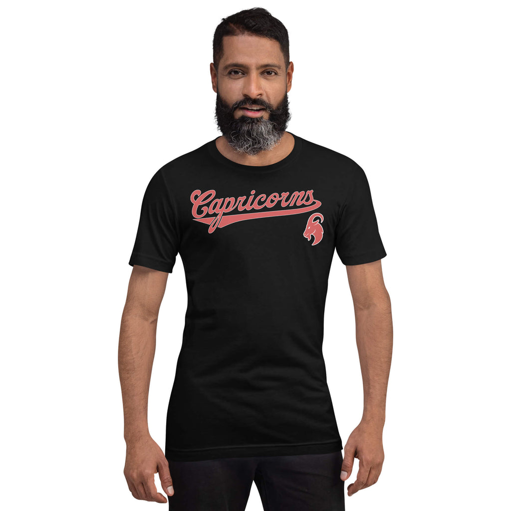 Man wearing a black t-shirt with 'Capricorn' logo on a white background