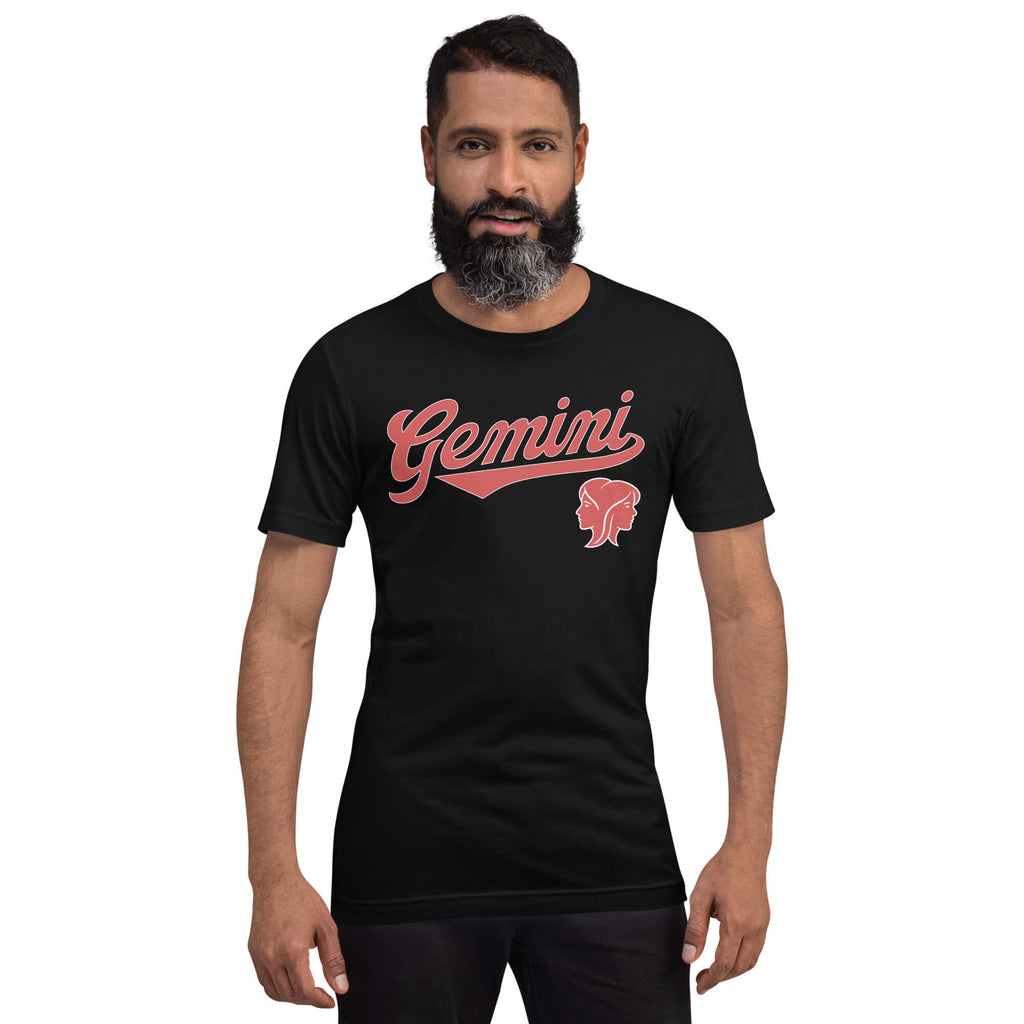 A man with a beard modeling a black short-sleeve t-shirt with a red 'Gemini' graphic and a red Gemini zodiac symbol on the chest, set against a plain white background.