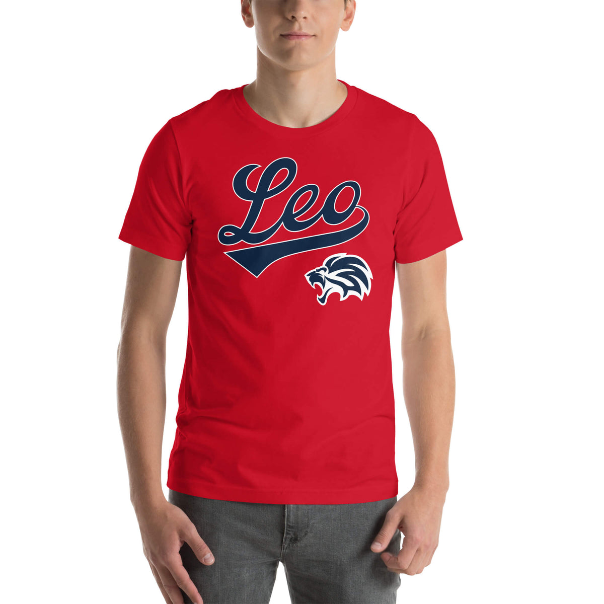 A man wearing a red short-sleeve t-shirt with a navy blue and white 'Leo' script graphic and a lion head logo on the chest, paired with gray jeans against a plain white background.