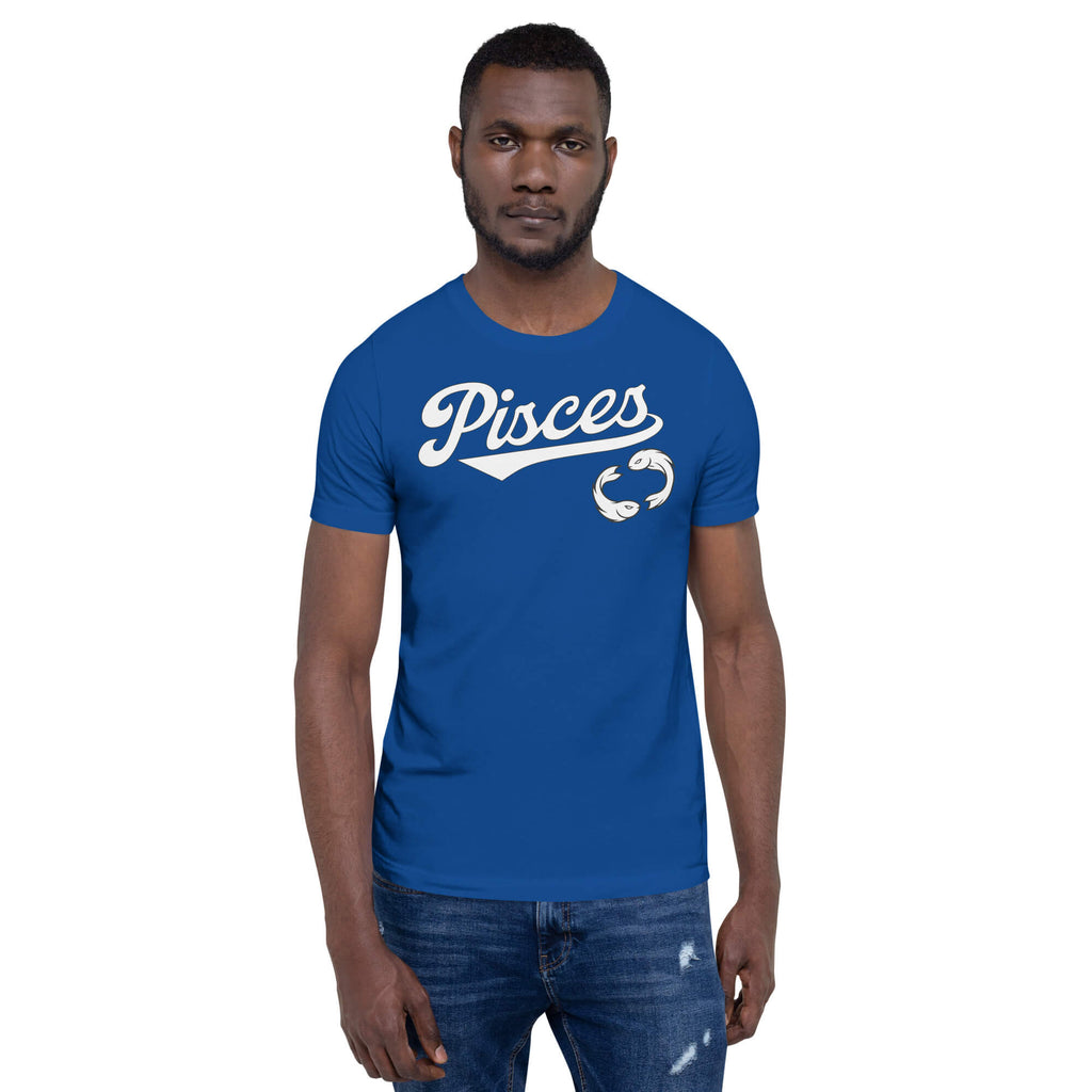 A man wearing a royal blue crewneck t-shirt with a white graphic that reads 'Pisces' and a zodiac symbol, paired with blue jeans, set against a plain white background.