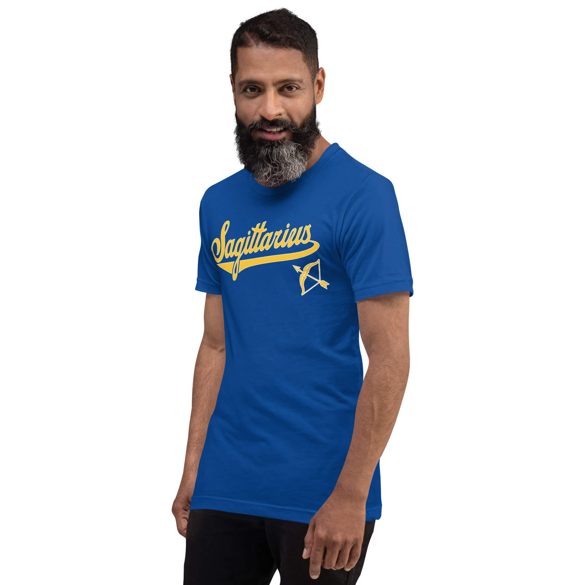 A man with a beard wearing a royal blue t-shirt with a gold 'Sagittarius' graphic and an arrow symbol on the chest, set against a plain white background.