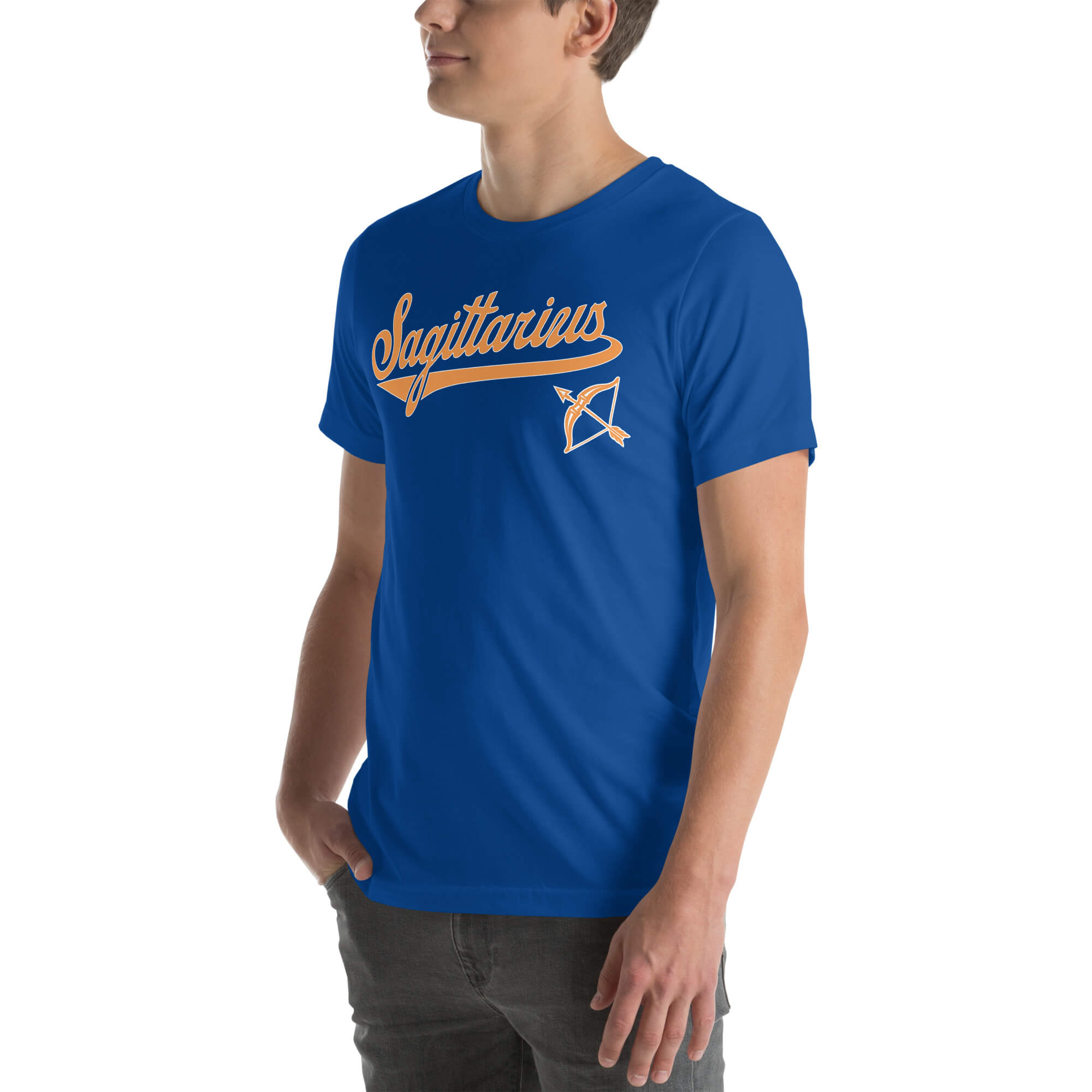 A man wearing a royal blue crewneck t-shirt with a vintage-style orange 'Sagittarius' graphic and a zodiac sign on the chest, set against a plain white background.