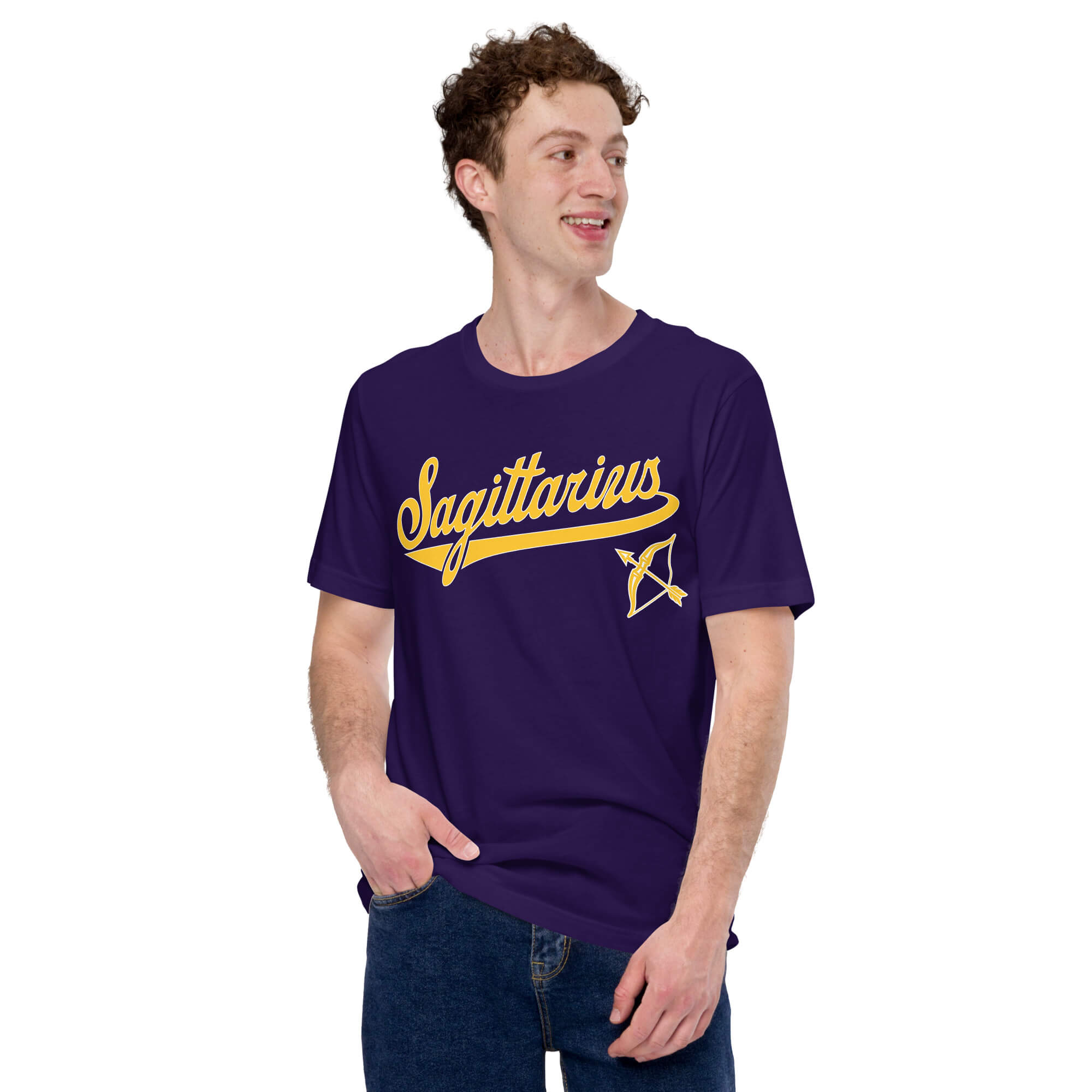 A man wearing a dark purple t-shirt with a gold 'Sagittarius' graphic and an arrow design on the chest, paired with blue jeans, set against a plain white background.