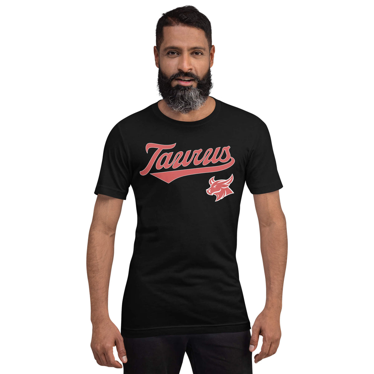 A man with a beard modeling a black short-sleeve t-shirt with a red 'Taurus' script graphic and a red bull logo on the chest, set against a plain white background.