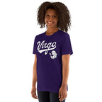 A woman with curly dark hair wearing a purple short-sleeve t-shirt with a white 'Virgo' graphic and zodiac symbol on the front, set against a plain white background.